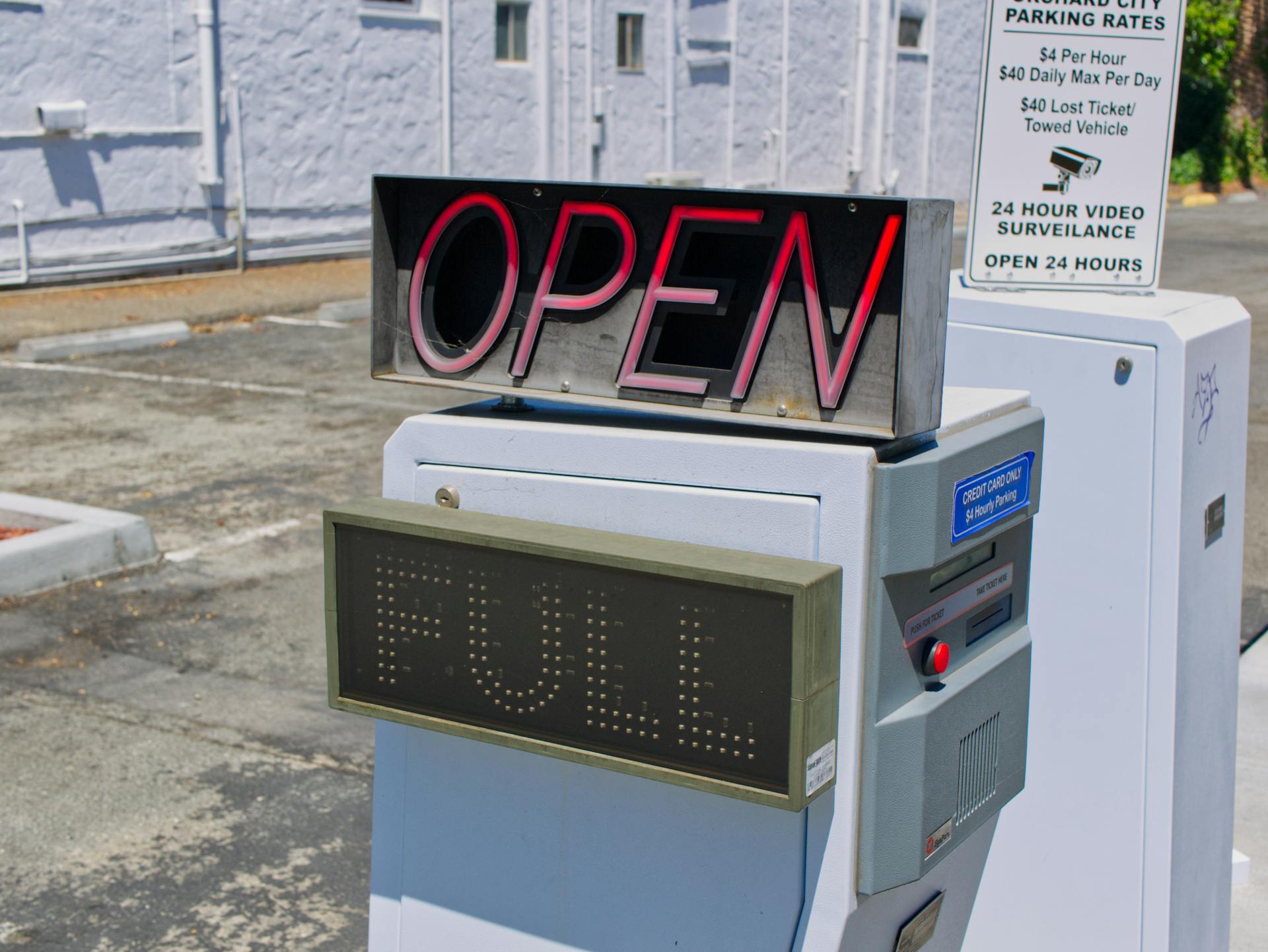 Old Parking Meter with Open Sign Lit up