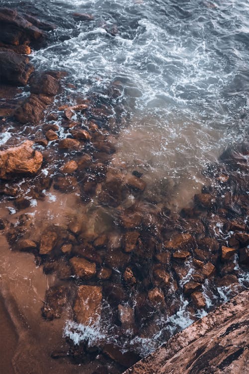 Shallow Water and Stones on Sea Shore