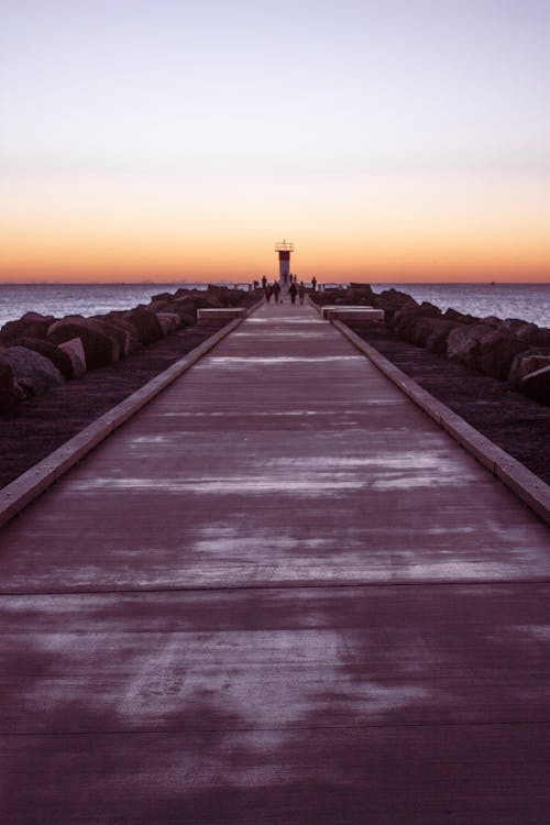 Ücretsiz altın saat, deniz, deniz feneri içeren Ücretsiz stok fotoğraf Stok Fotoğraflar