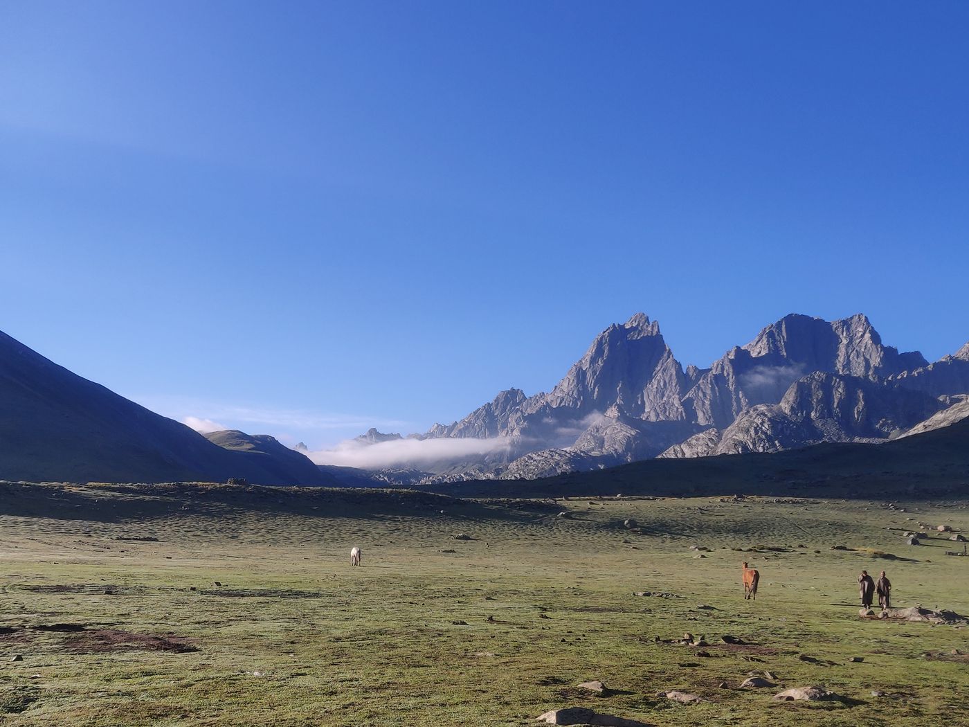 Expansive mountain landscape under open sky