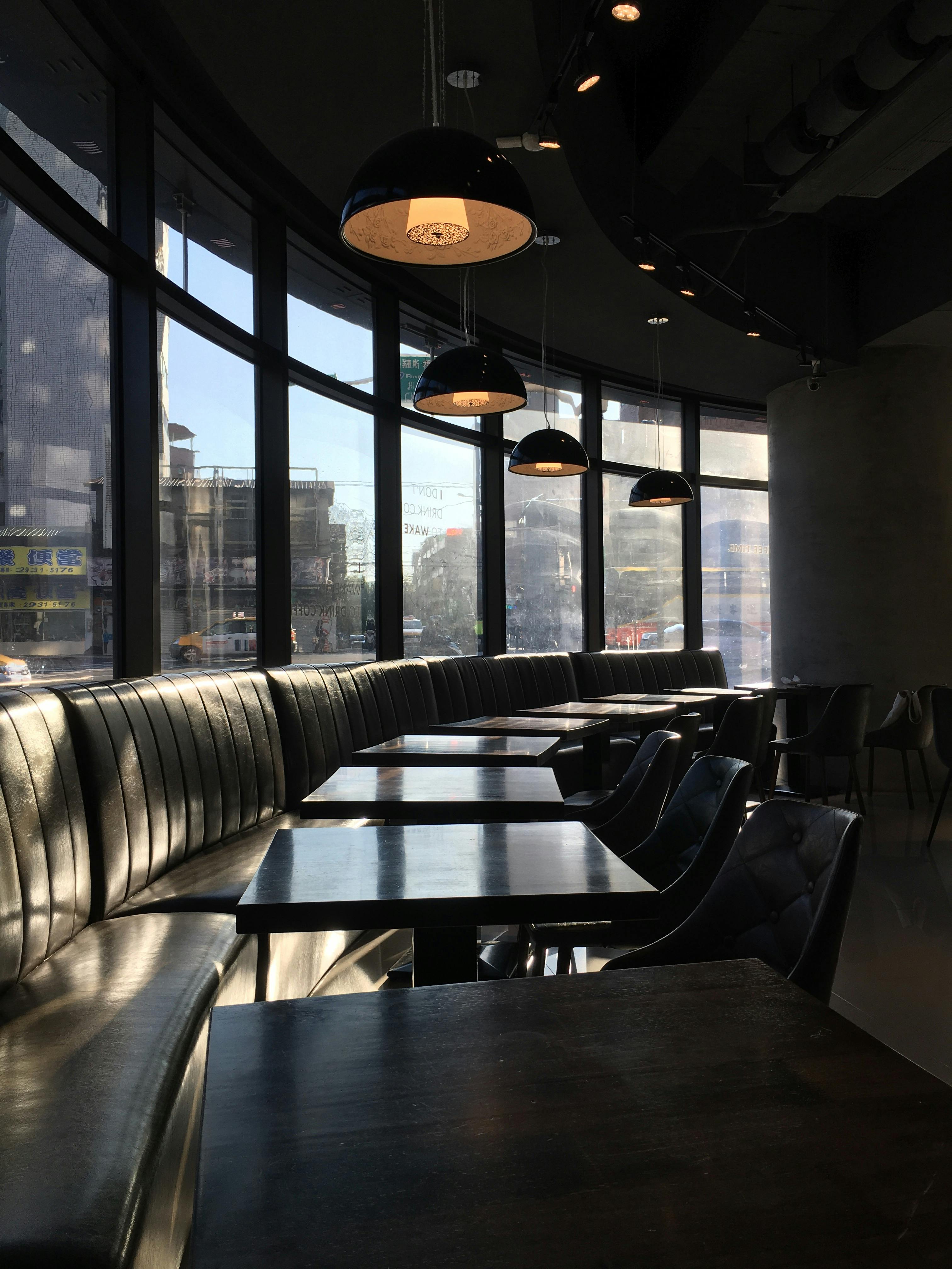 Tables and Chairs in a Coffee Shop · Free Stock Photo