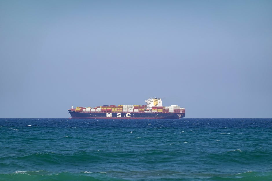 A large cargo ship navigates the open sea near Umhlanga, KZN, South Africa.