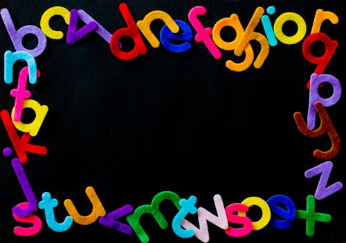 Black Background With Alphabet Letters Text Overlay