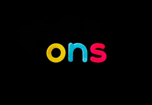 Bright colorful letters 'ons' on a black background, vibrant and eye-catching.
