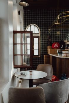 A serene, modern café in Istanbul featuring stylish furniture and inviting ambience, perfect for relaxation.