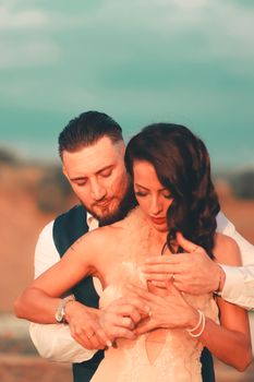 Tender moment with a couple embracing, focusing on romance and unity.