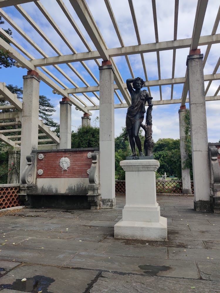 Bronze Statue In Abandoned Patio