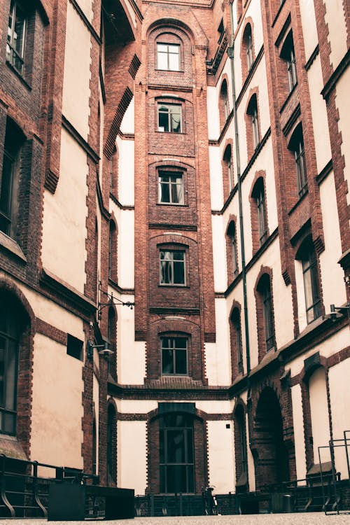 Low Angle Shot of Brown Brick Building