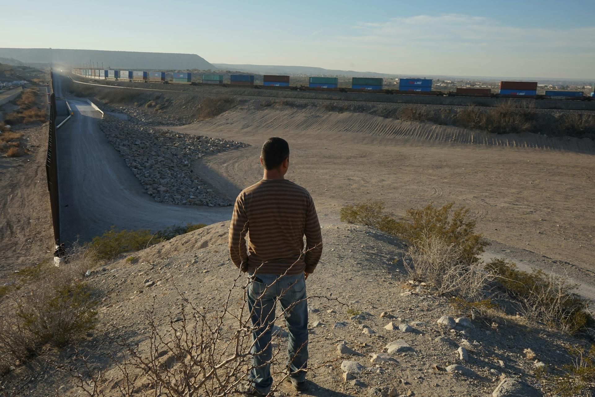 A Man Standing by the Border