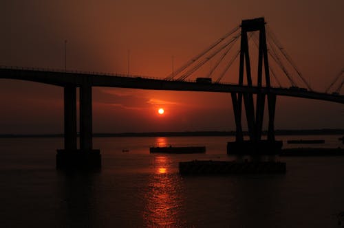 Kostenloses Stock Foto zu brücke, goldene stunde, puente general manuel belgrano