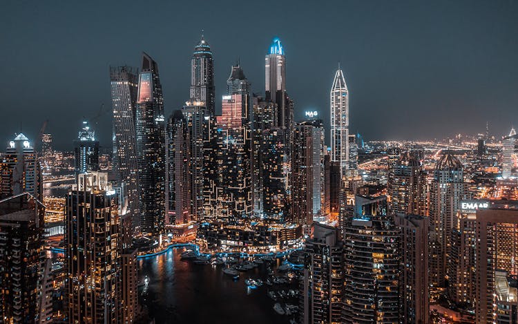 An Aerial Shot Of The City Of Dubai At Night