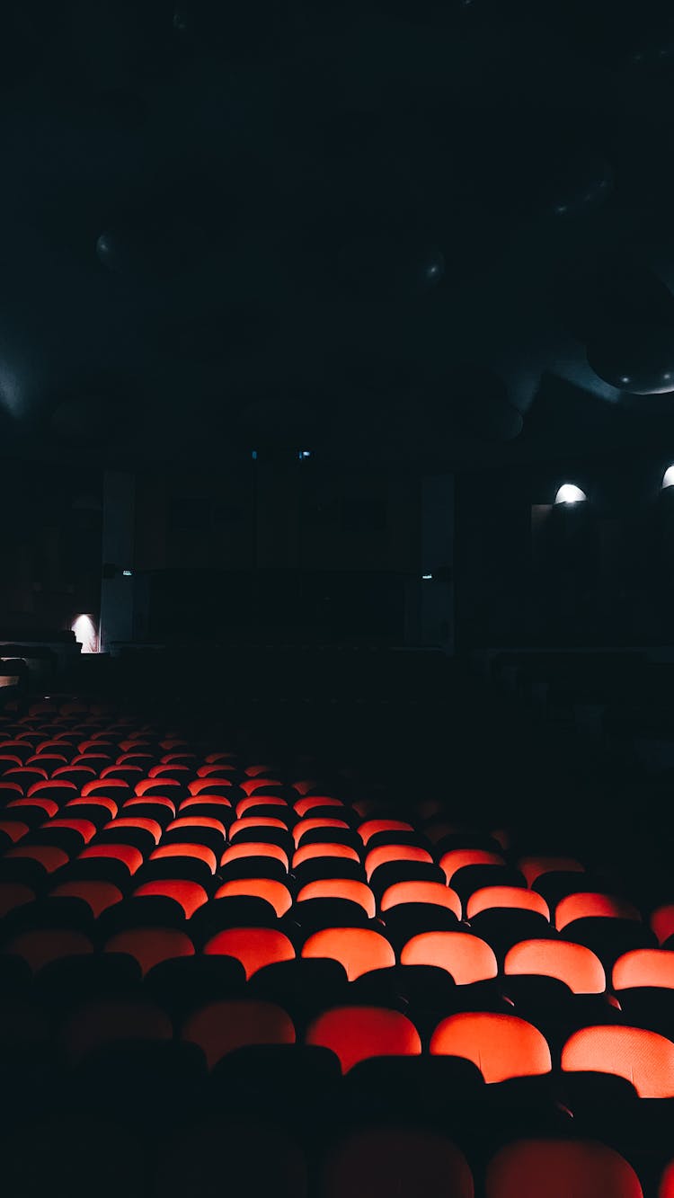 Red Chairs In A Theatre 