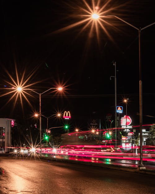 Gratis lagerfoto af byens lys, lang eksponering, lodret skud