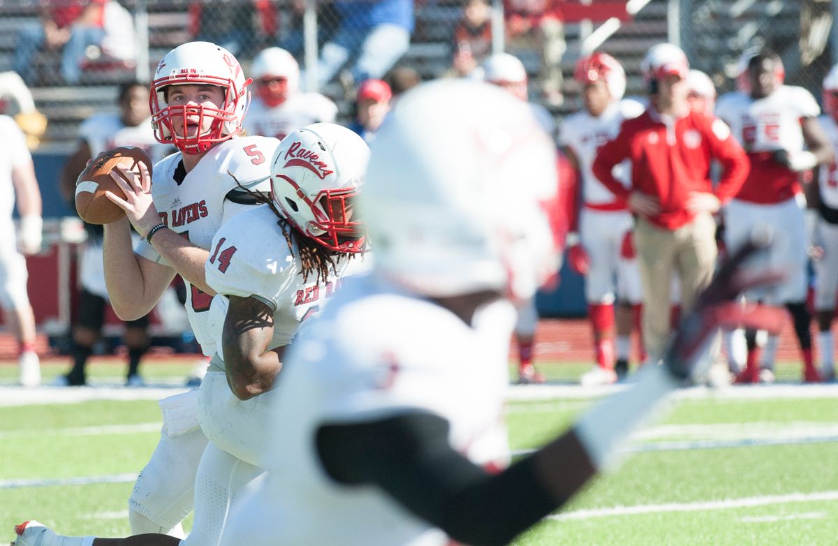Football players captured mid-action during a lively game
