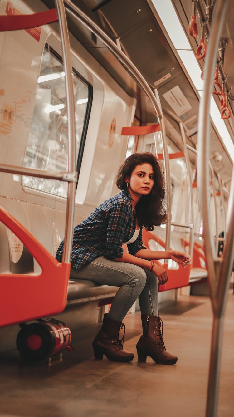 Pretty Woman In Shirt In Subway Train