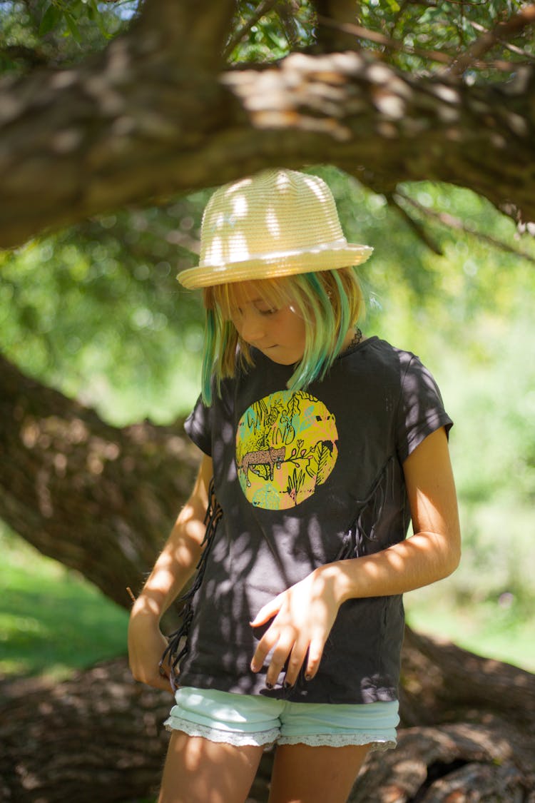 Cute Girl With Colored Hair Wearing A Hat