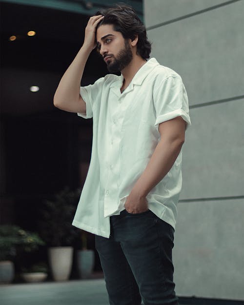 A Man Wearing a White Button Up Shirt