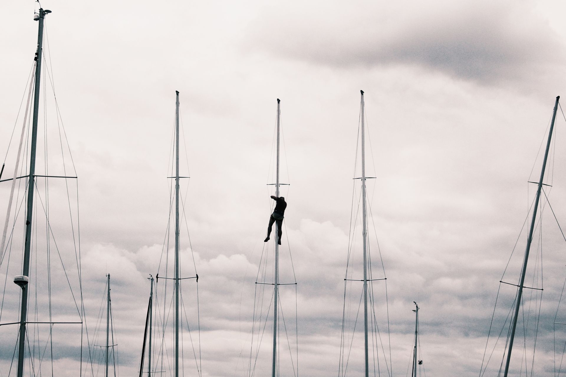 Man Climb on Post