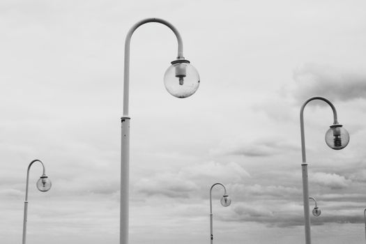 Grey Scale Photography of Lamps