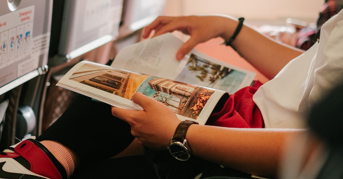 Readability Magazine Person Reading a Magazine · Free Stock Photo