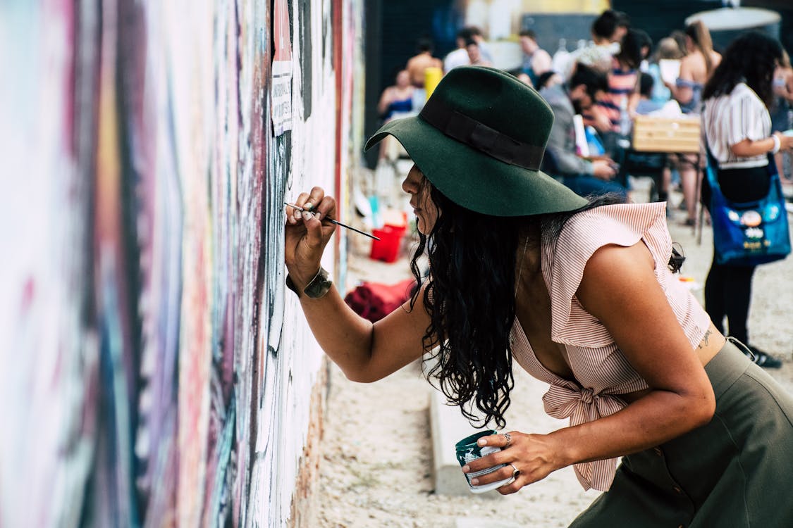 Free Photo of Woman Painting on Wall Stock Photo