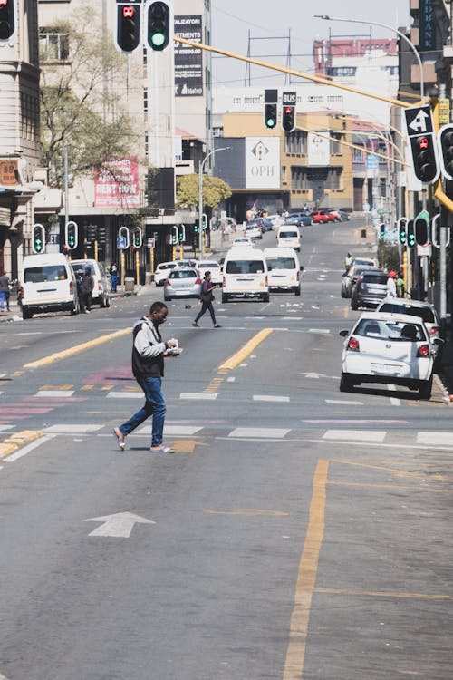 A Man Crossing a Street