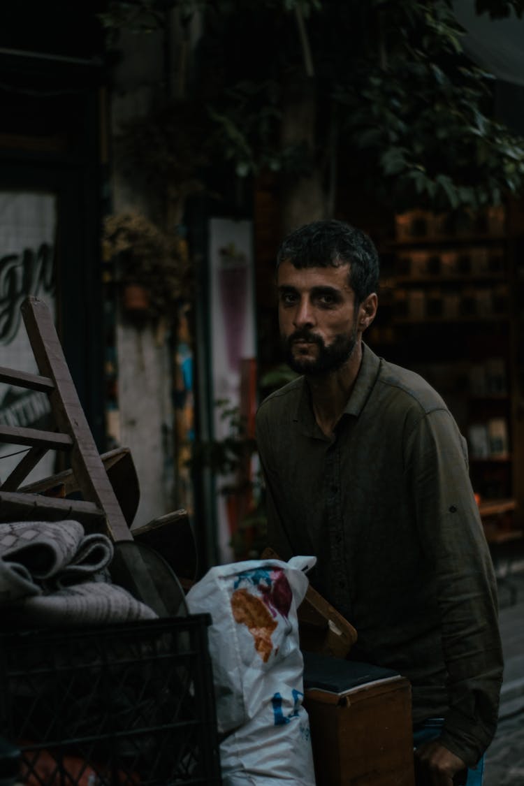 Man With A Beard Pushing A Cart