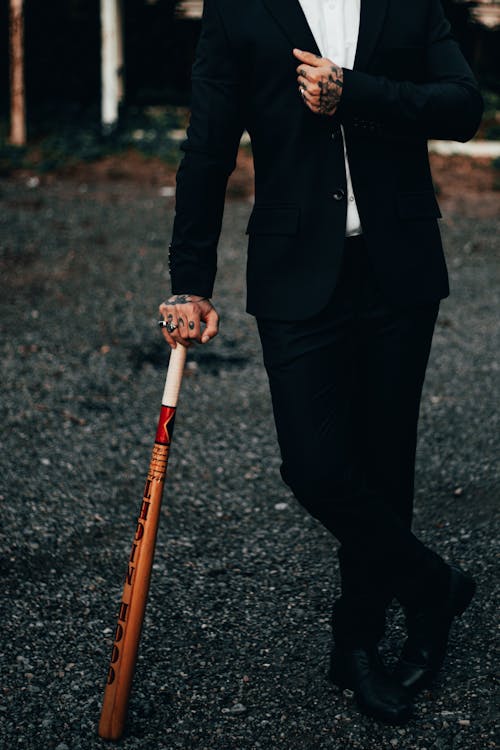 Foto profissional grátis de bastão de baseball, com tinta, homem