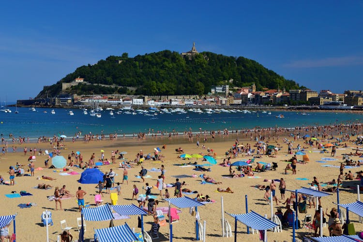 People At The Beach Of La Concha In Spain