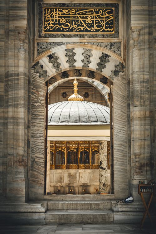 Free Intricate archway leading to Suleymaniye Mosque courtyard in Istanbul, showcasing Islamic architecture. Stock Photo
