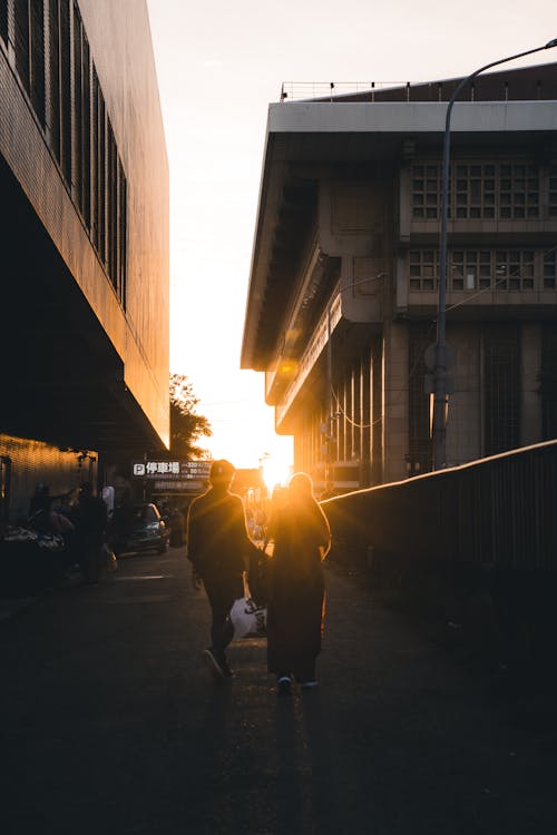 Sunbeam passing through between Two People 