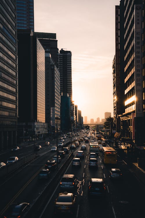 An Aerial Shot of a Cars Travelling on a Road in a City