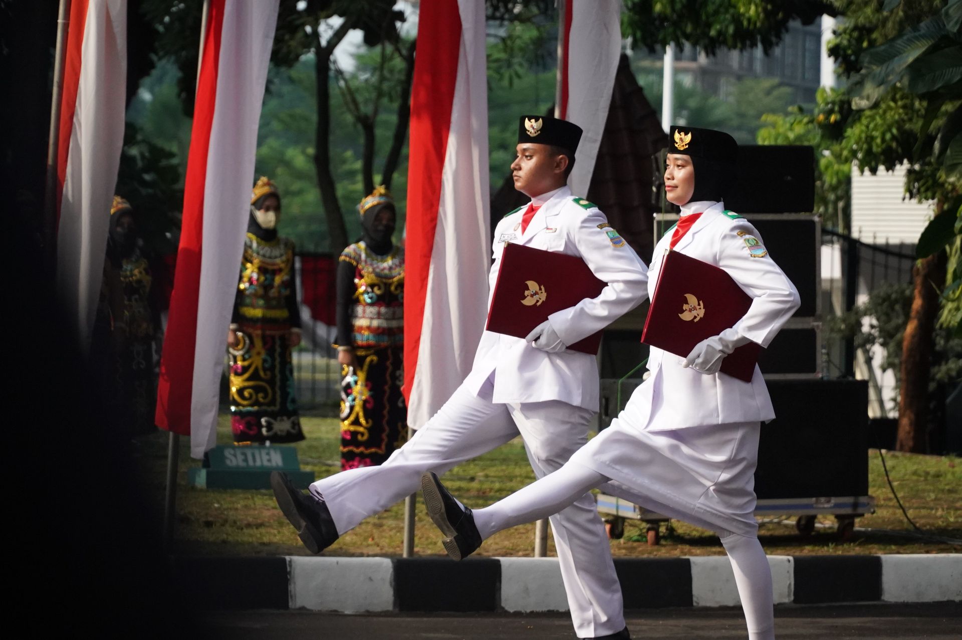 Two People in an Honorable Uniform marching on a Ceremony