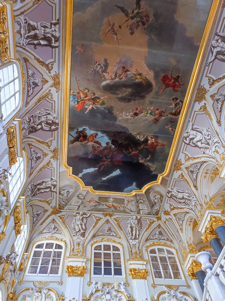 Low Angle Shot Of A Painted Ceiling With Angels On Clouds