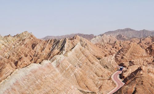 Free Discover the vibrant multicolored mountains of Zhangye Danxia Geopark, a geological marvel in China's Gansu province. Stock Photo