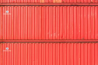 Stacked industrial shipping containers — Jan van der Wolf on Pexels