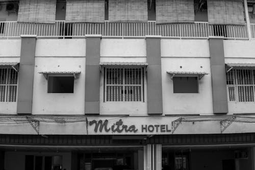A Grayscale of a Hotel