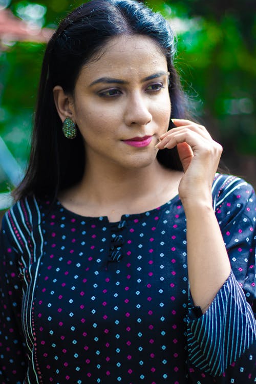 A Woman Wearing Polka Dots Long Sleeves