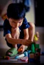 Soft Focus Photo of Child playing Toys