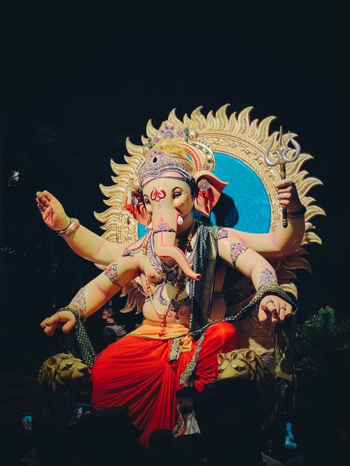 Free Vibrant depiction of a Ganesha idol with intricate details, capturing Hindu culture and artistry. Stock Photo