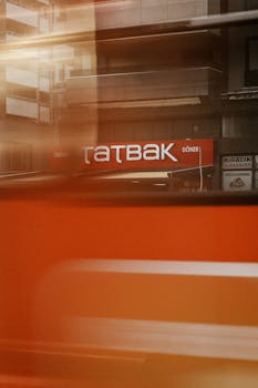 Motion blur photo of Tatbak Döner sign in Gaziantep, Turkey, capturing urban energy.