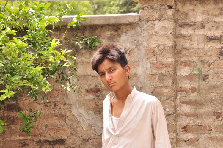 A Portrait Of A Boy Wearing A Chinese Collared Shirt