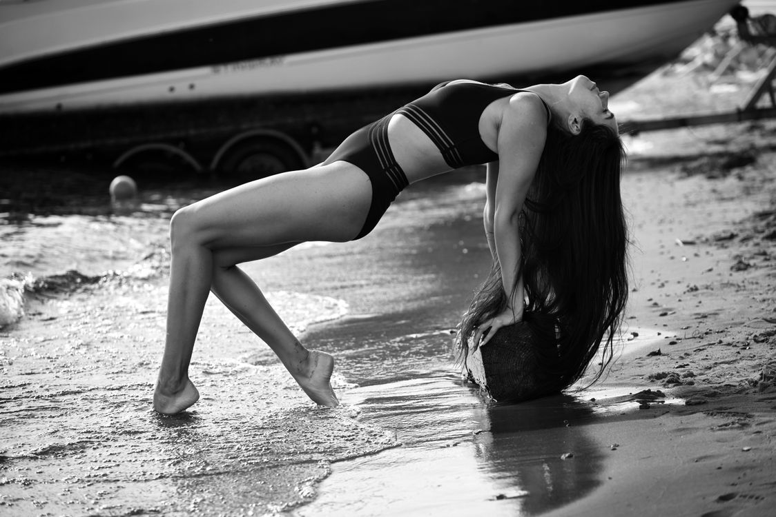 A Woman Wearing Swimsuit Posing on the Beach · Free Stock Photo
