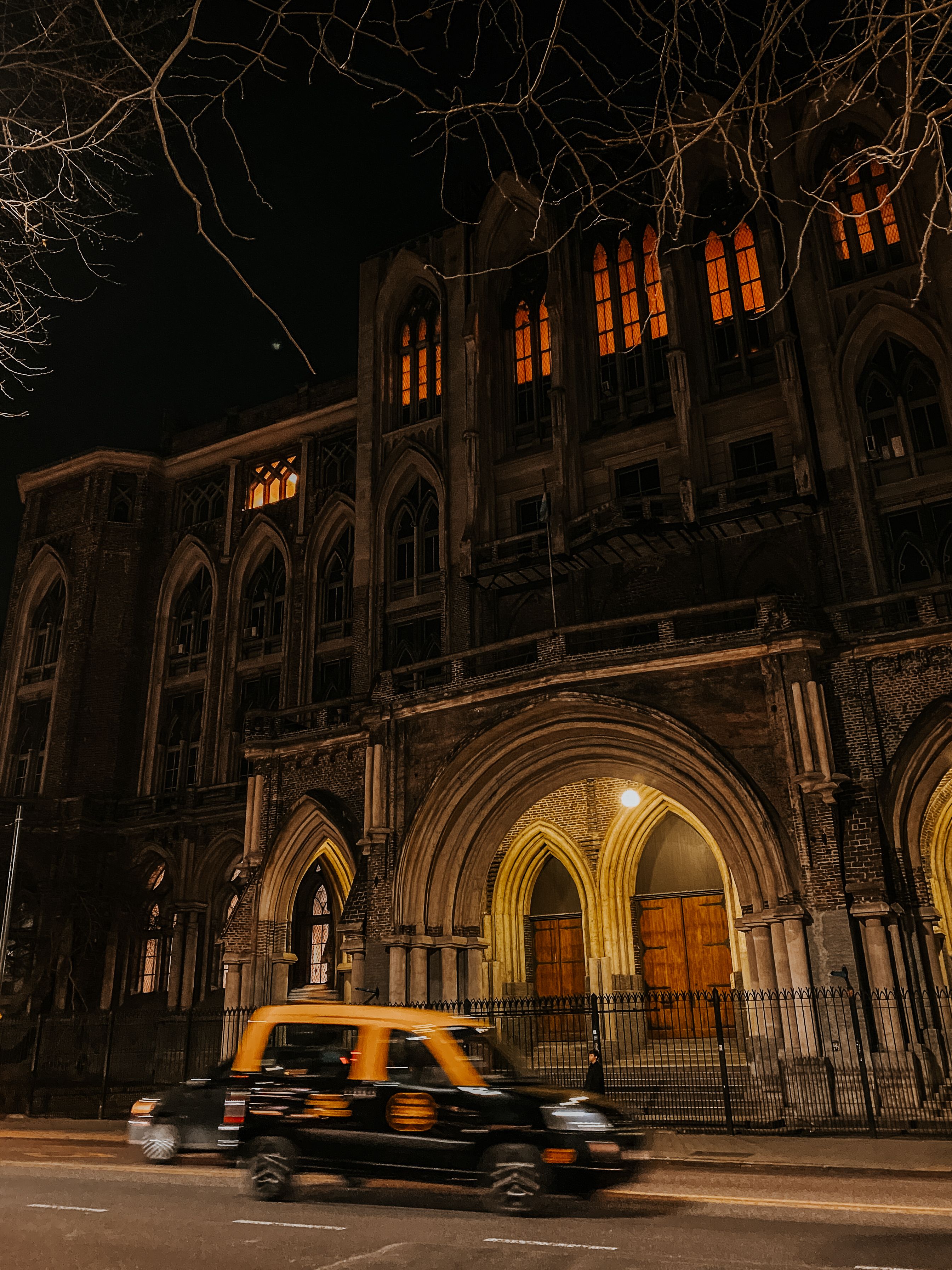 Taxi near Building at Night · Free Stock Photo