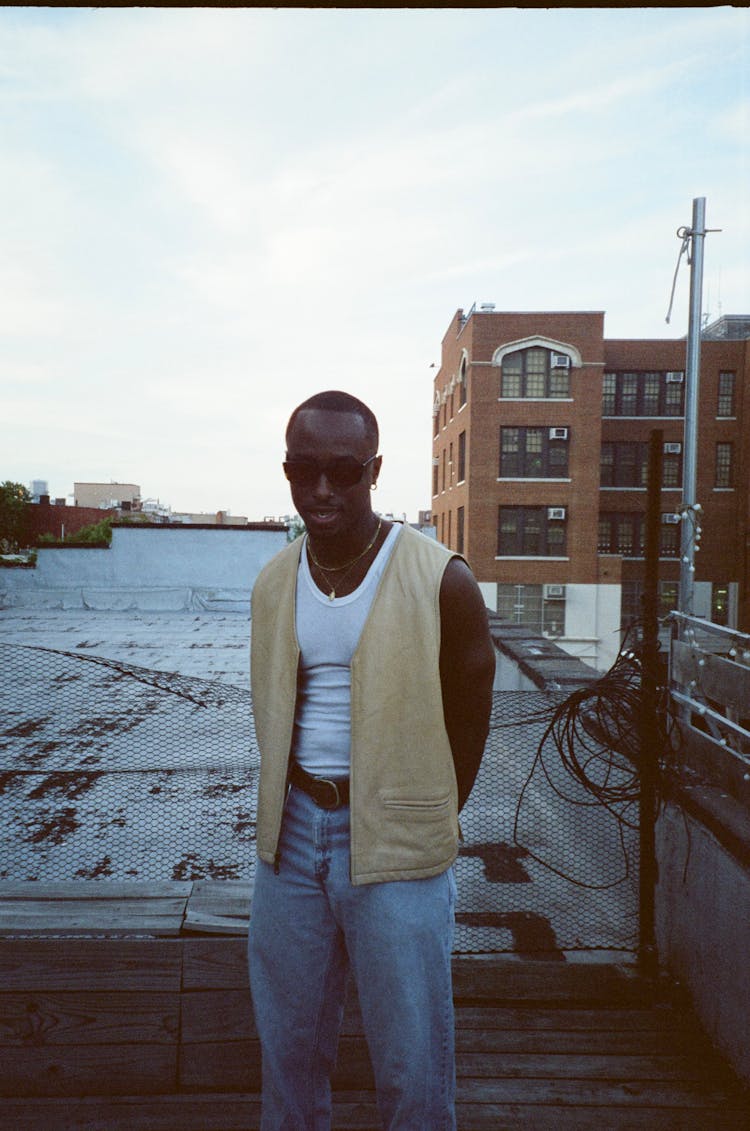 Stylish Young Man Posing On Rooftop