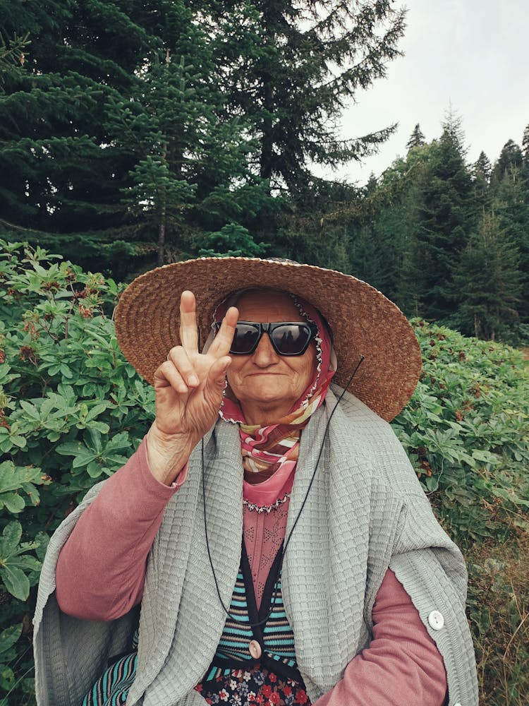 Cool Old Woman Showing Victory Gesture