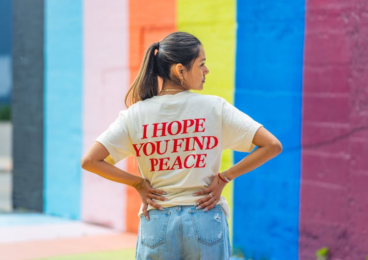 Woman In Quote On The Back Of Her T Shirt