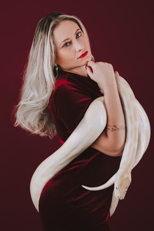 Woman Holding Snake