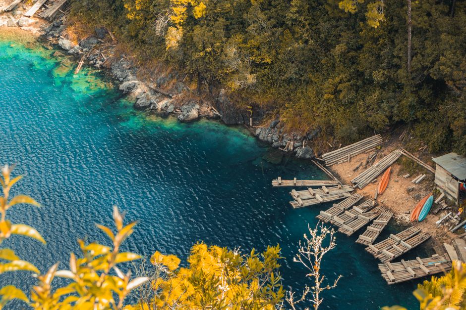 Kayangan Lake, Coron, Palawan, Philippines with crystal clear water and lush cliffs.