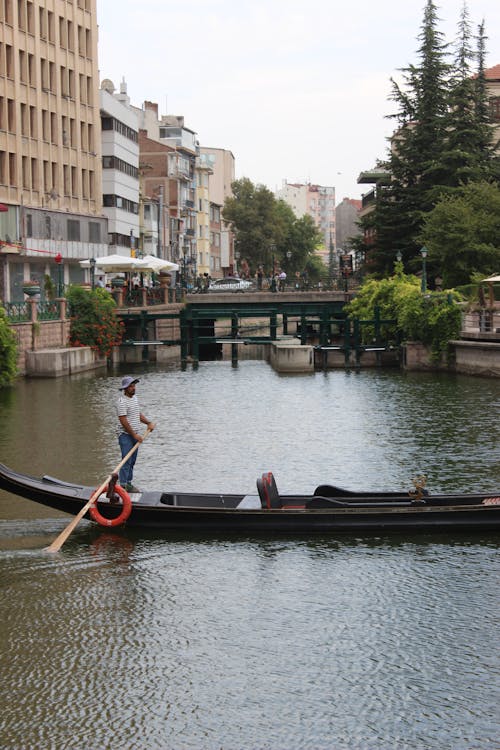 Man Paddling a Gondola